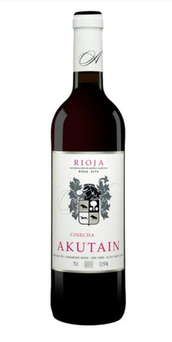 A bottle of Rioja Akutain red wine with a white label and dark glass body, shown against a plain white background.