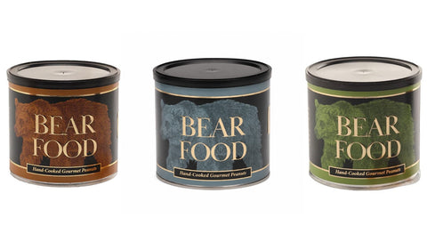 Three bear-shaped candle tins labeled 'BEAR FOOD' on a plain white background, with brown, blue-gray, and green labels.