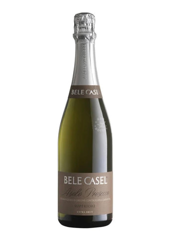 A bottle of Bele Casel Apple Preser Non-Alcoholic Sparkling Wine, featuring a dark green glass bottle, silver foil, and a brown label with white text, set against a plain white background.