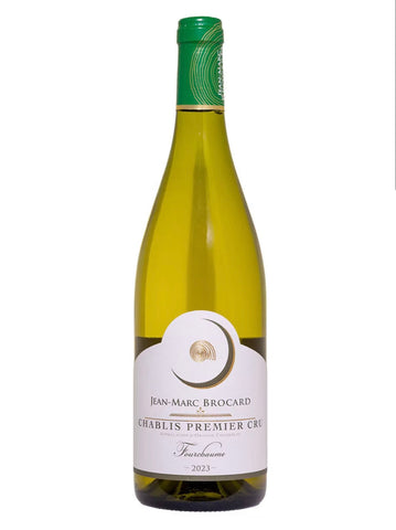 A bottle of Jean-Marc Brocard Chablis Premier Cru white wine, featuring a pale yellow-green glass bottle, a green foil seal, and a white label with gold and black text.