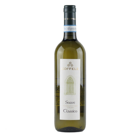 A bottle of Coffele Soave Classico white wine with a white label and a dark green glass bottle, shown against a plain white background.
