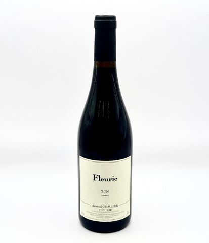 A bottle of Fleurie red wine, 2009, with a cream-colored label and a black capsule, photographed against a plain white background.