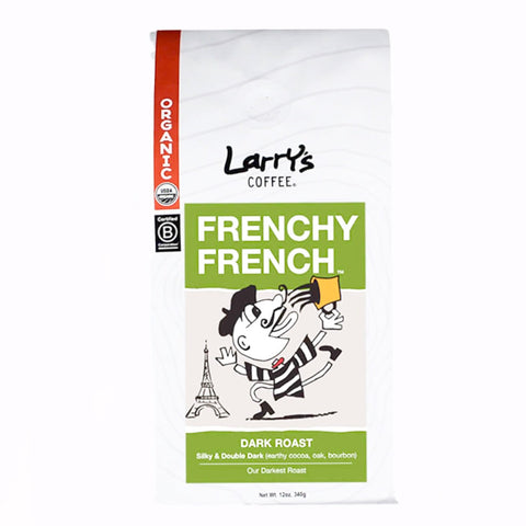 A bag of Larry's Coffee Frenchy French Dark Roast coffee on a plain white background. The packaging is primarily white with a green block containing the product name, a red vertical band labeled Organic, and a cartoon character holding a French flag next to the Eiffel Tower.
