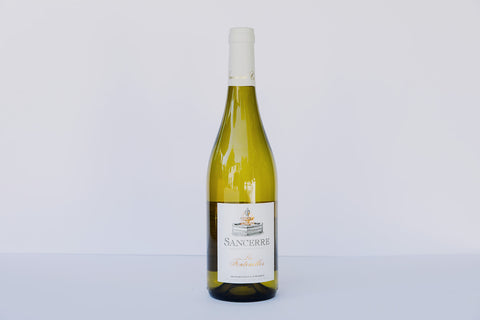 A bottle of Les Fontenelles Sancerre white wine against a white background.
