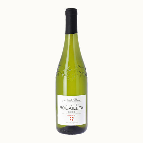 A bottle of Les Rocailles Apremont Savoie white wine with a label that includes the name of the wine and the region 'Savoie'.