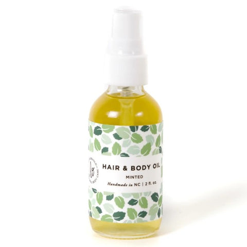 2 Oz. bottle of Lo & behold Minted Hair & Body Oil