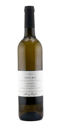 A bottle of Douro white wine with a dark green glass body, a white label, and a black screw cap, shown against a plain white background.