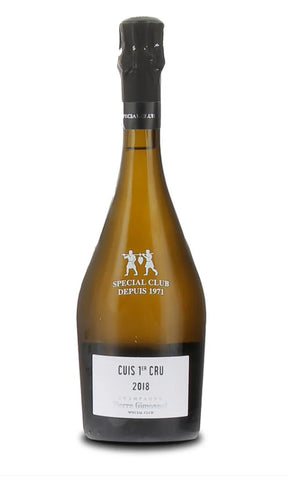 A bottle of Cuis 1er Cru 2018 Champagne from the Special Club, featuring an amber glass bottle, a black foil top, and a white label with black text.