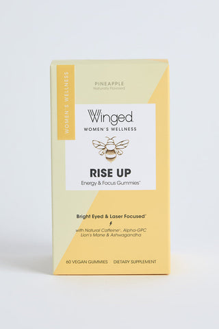 A package of 'Rise Up: Energy + Focus Gummies' by Winged. The packaging is yellow and white with an illustration of a gummy candy and text detailing the product name and brand.