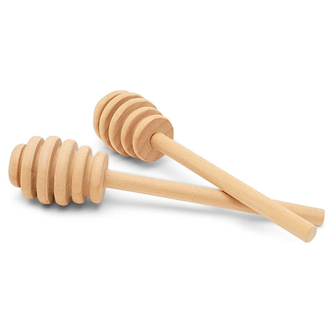 Two natural wood honey spoons with ridged heads, crossed on a clean white background.