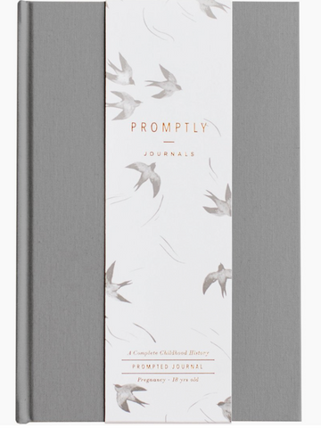 A gray Promptly Childhood History Journal with bird illustrations on the cover.